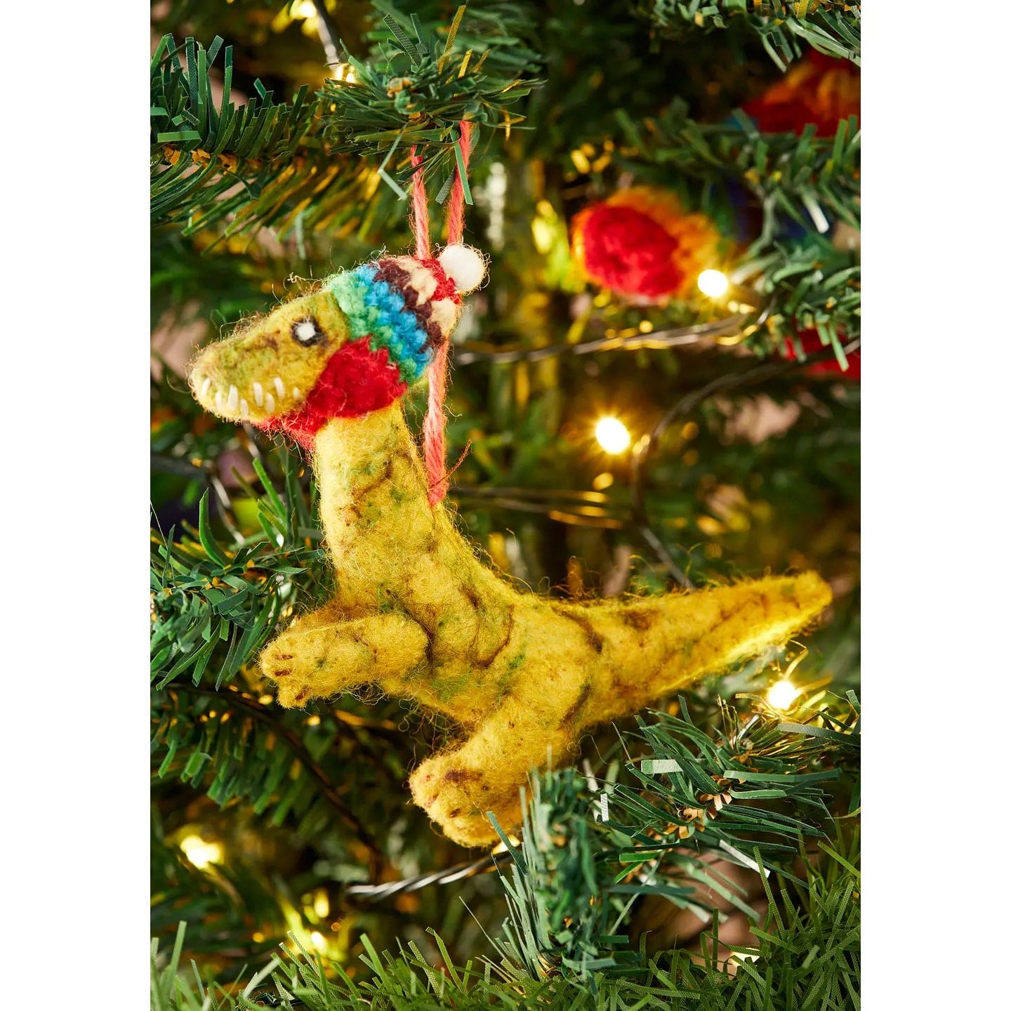 Felt So Good Christmas Decorations Felt T-Rex in Rainbow Knitted Wool Hat - HDEC145