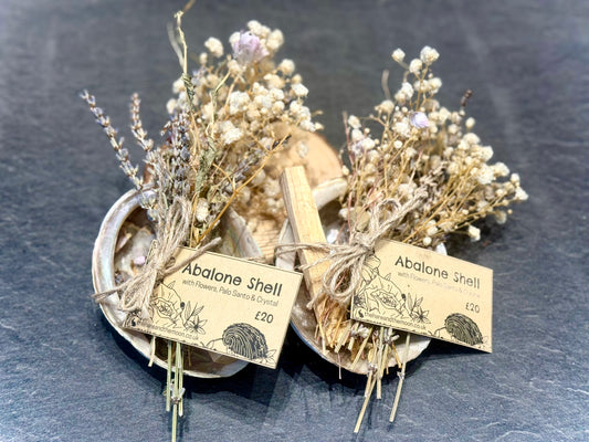 ABALONE SHELLS WITH FLOWERS, PALO SANTO AND CRYSTAL