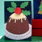 The Black Rabbit Cards Christmas Pudding - Greeting Card with Badge - C58